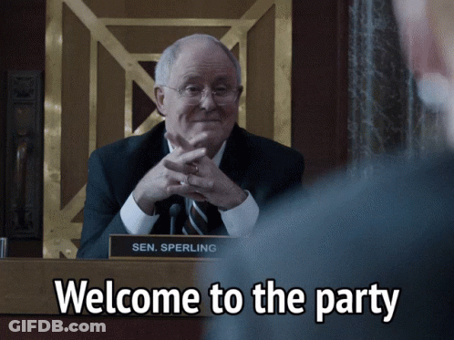 Sen. Sperling Is Sitting At A Podium With The Words Welcome To The Party Below Him GIF