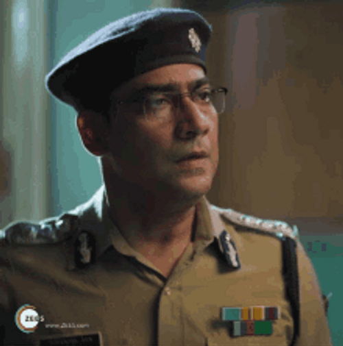 Senior Asian Police Office Salute GIF