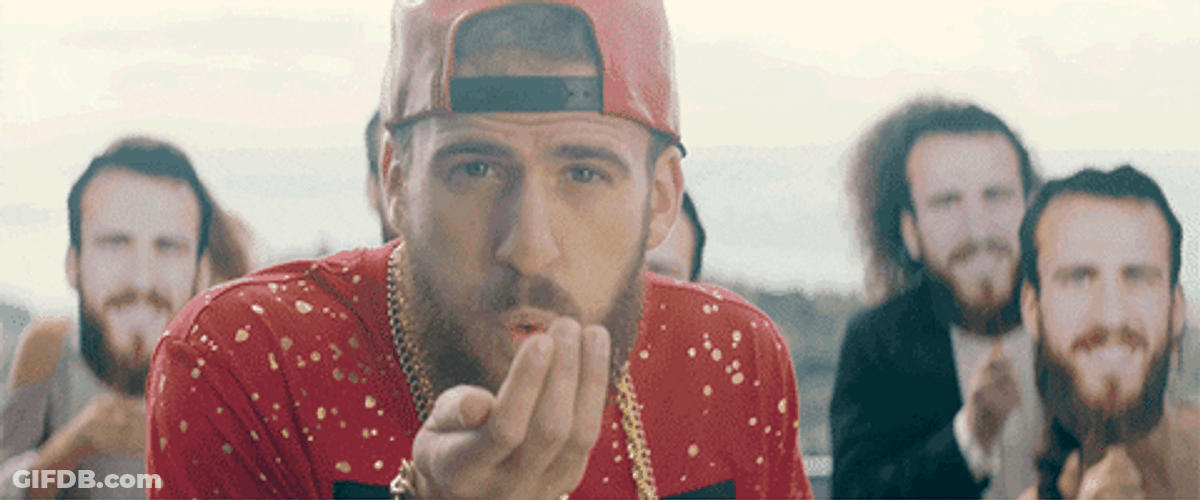 Sergio Rodriguez Blows Yellow Glitter Bomb GIF
