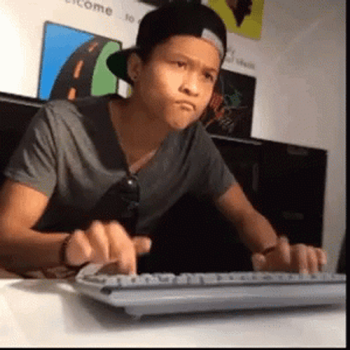 Serious Boy Funny Typing Fast GIF