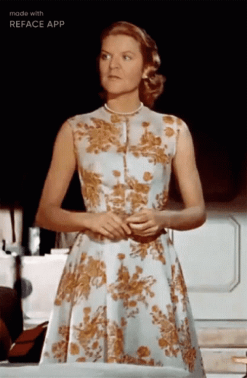 Serious Grace Kelly Looking Down GIF