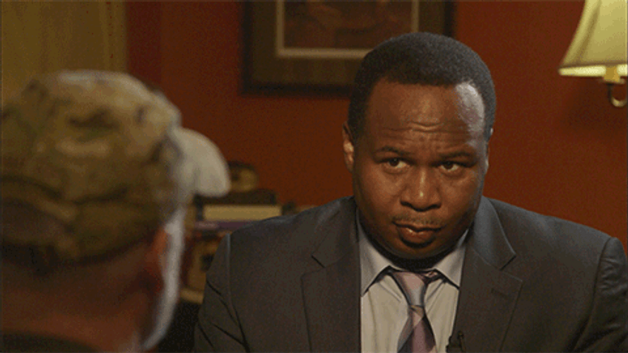 Serious Guy Eyebrows Up GIF