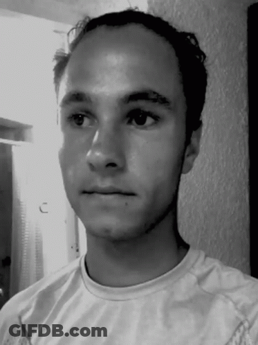 Serious Man In White Shirt GIF