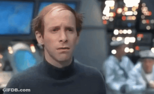 Serious Red-Haired Man In Black Turtleneck GIF