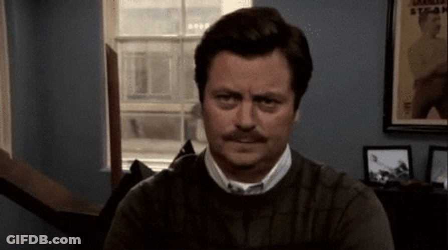 Serious Ron Swanson Talking GIF