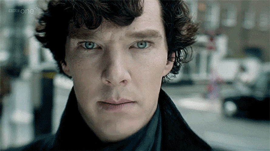 Serious Sherlock Holmes Touching Camera GIF