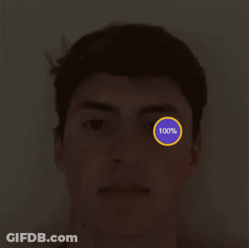 Serious Young Man In Front Of Wall GIF