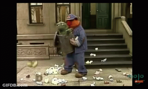 Sesame Street Character Holding Trash Can GIF