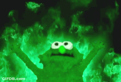 Sesame Street Character Surrounded By Green Flames GIF