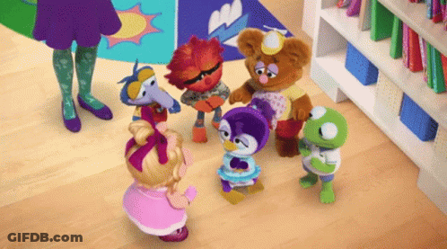 Sesame Street Characters Around Girl GIF