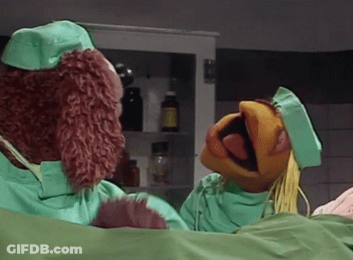 Sesame Street Characters In Green Scrubs Talking GIF