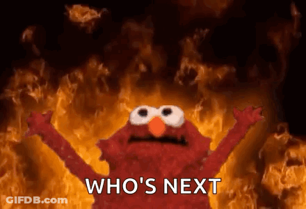 Sesame Street Elmo In Front Of Fire Saying Who's Next GIF