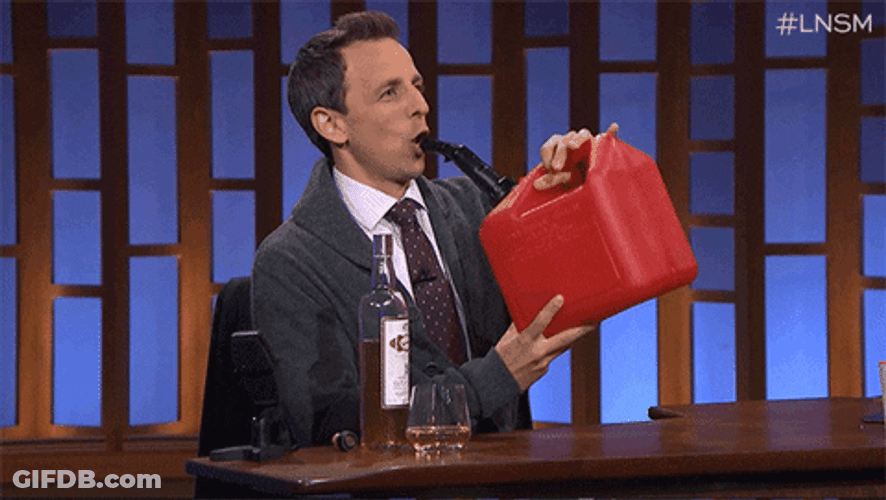 Seth Meyers Drinking Gas GIF