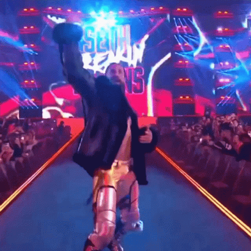 Seth Rollins Rocking On The Stage GIF