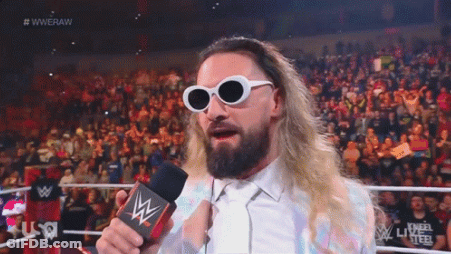 Seth Rollins Shades Down On An Interview GIF