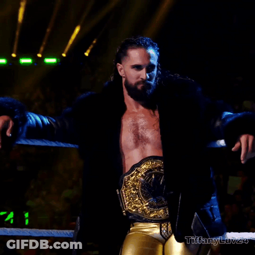 Seth Rollins Wearing His Winning Belt GIF