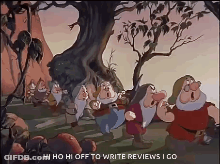 Seven Dwarfs Standing Under Tree In Woods GIF