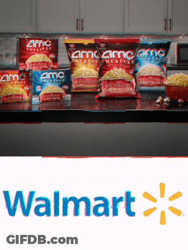 Several Bags Of Amc Popcorn Sit On A Counter GIF