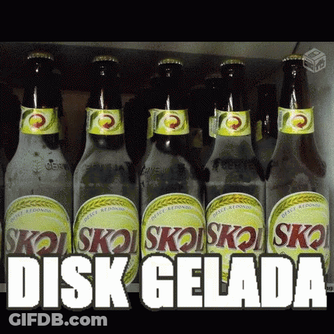 Several Bottles Of Skol Beer Are Lined Up In A Refrigerator GIF