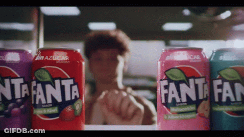 Several Cans Of Fanta Lined Up GIF