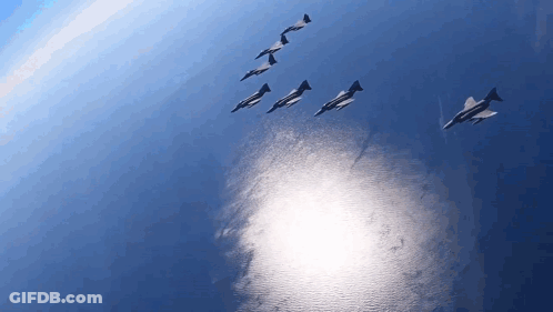 Fighter Jets Flying Over Ocean GIF