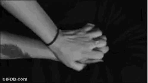 Sexy Couple Holding Hands In Bed GIF