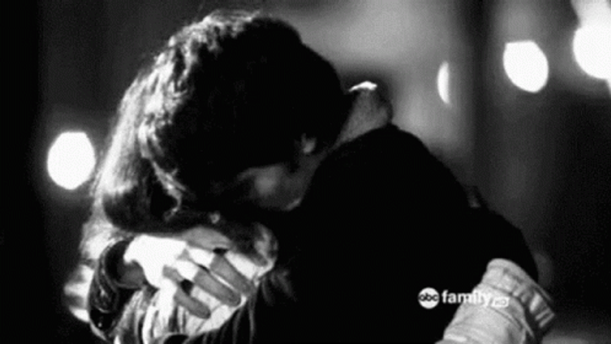 Sexy Couple Kissing Goodbye GIF