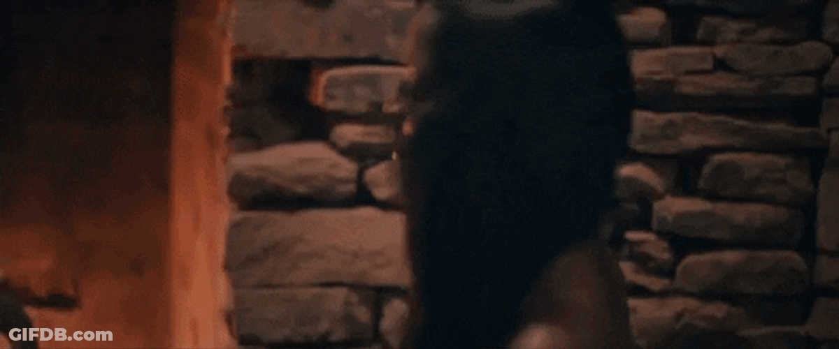 Sexy Dance Beside Fireplace GIF