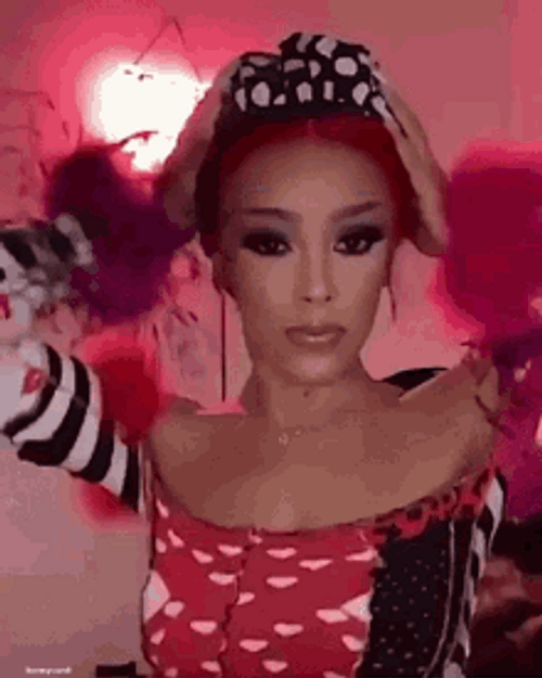 Sexy Doja Cat Fixing Red Hair GIF