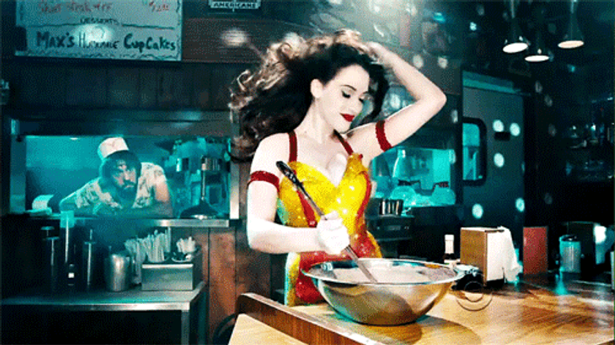 Sexy Kat Dennings Cooking Dancing GIF