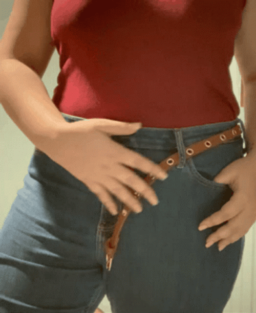 Sexy Lady Removing Slender Belt GIF