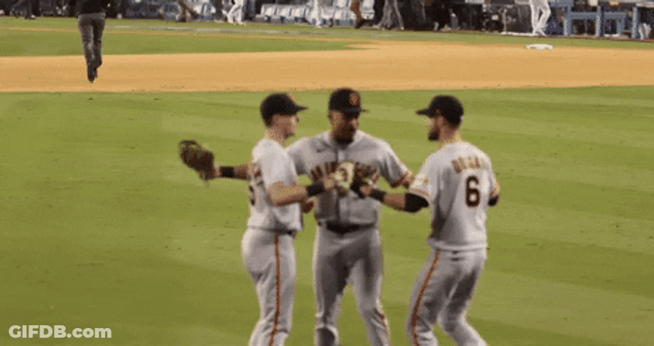 Sf Giants Players Hugging In The Field GIF