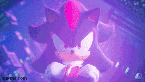 Shadow The Hedgehog Is A Cartoon Character From The Video Game Sonic The Hedgehog And Is Holding A Remote Control . GIF