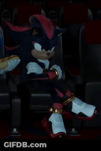 Shadow The Hedgehog Sitting In Dark Room With Hot Dog GIF