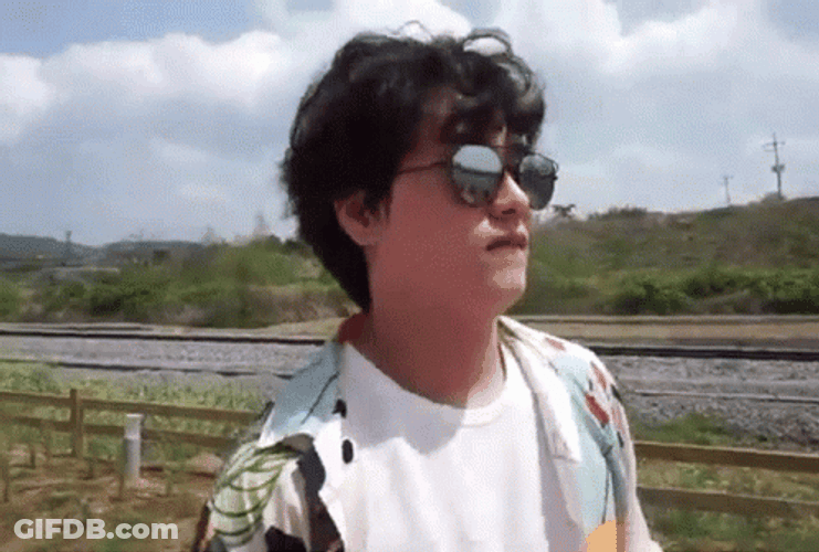 Shake Fist Man Wearing Shades GIF