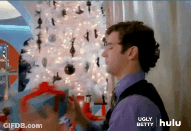 Shaking Gift Shocked Man Reaction GIF