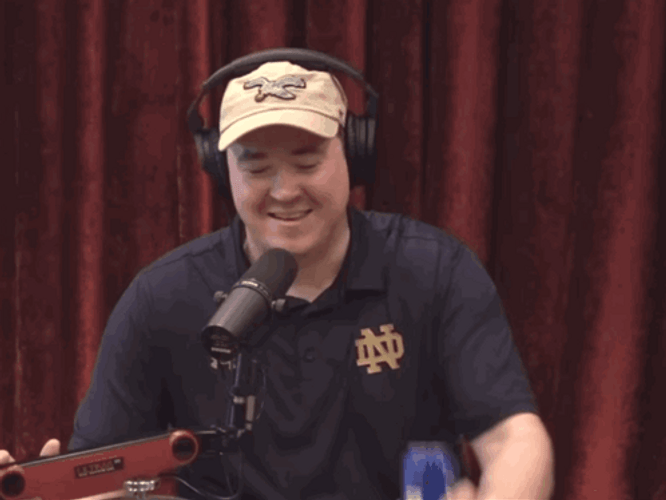 Shane Gillis Drinking Soda Wide Eyes GIF