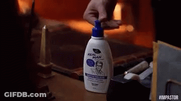 Shaquille O'Neal Holding Gold Bond Shampoo GIF