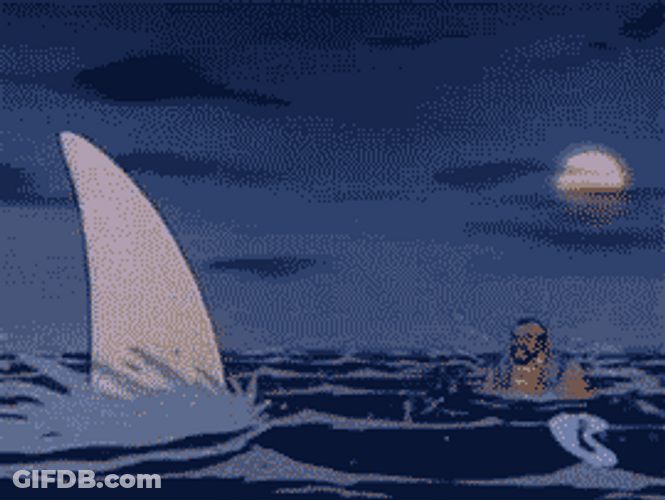 Shark Attack Punched Away Cartoon GIF