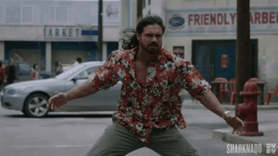 Sharknado Falling Over A Guy GIF