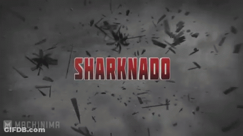 Sharknado Is Written In Red Letters On A Gray Background GIF