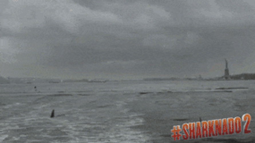 Sharknado Jumping Shark Eating A Woman GIF