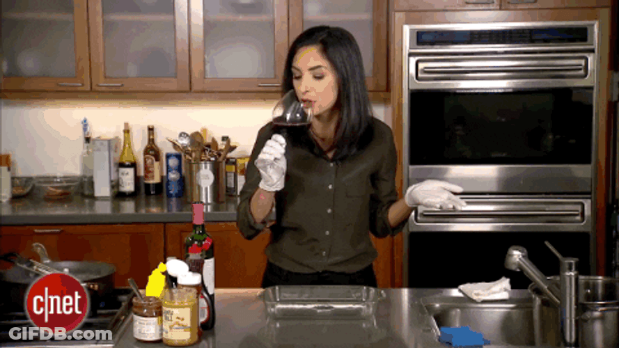 Sharon Profis Pouring Wine Onto Apple Watch GIF