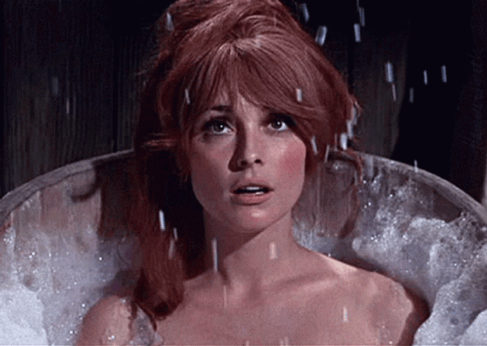 Sharon Tate Raining Bubbles GIF