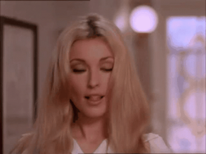 Sharon Tate Showing Paper GIF