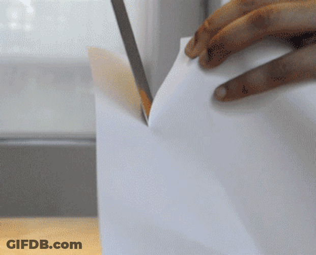 Sharp Knife Cutting Bond Paper GIF