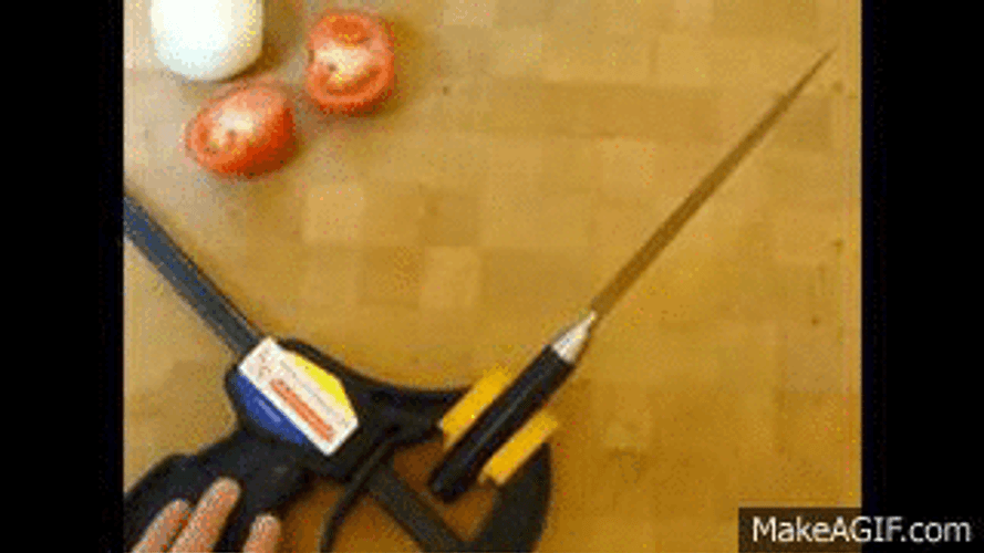 Sharp Knife Cutting Tomatoes GIF