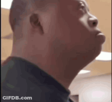 Shaved Head Man Looking Up GIF