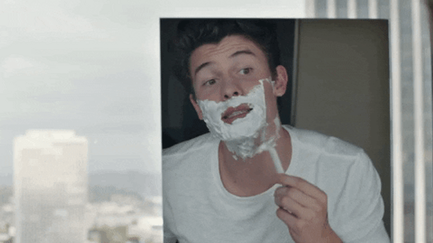 Shawn Mendes Shaving In Front Of Mirror GIF