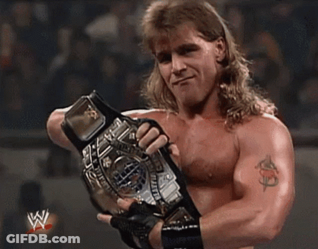 Shawn Michaels Showing Off Championship Belt GIF